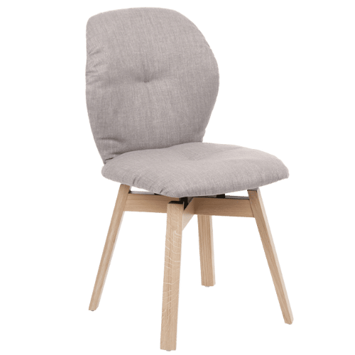 On y voit une chaise design blanche